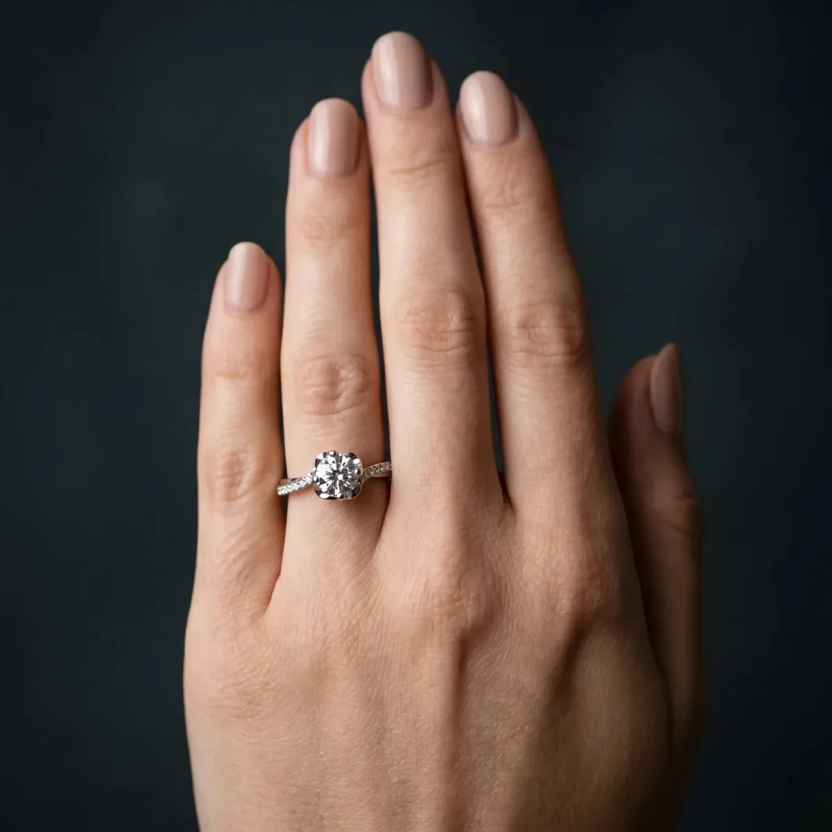 Round Cut Diamond Solitaire Ring with Pavé Band and Sculpted Prong Setting Silver
