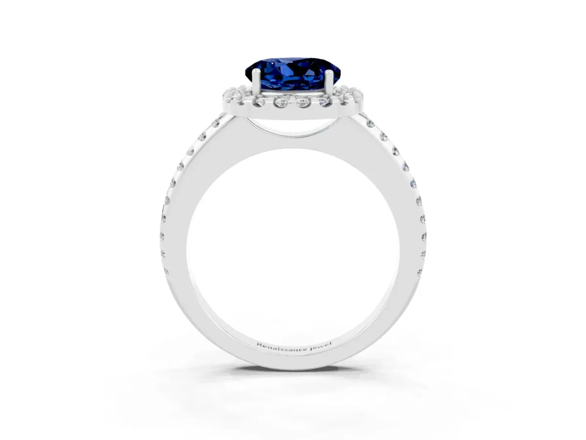 Round Cut Blue Sapphire Pavé Halo Ring with Four-Prong Setting Platinum