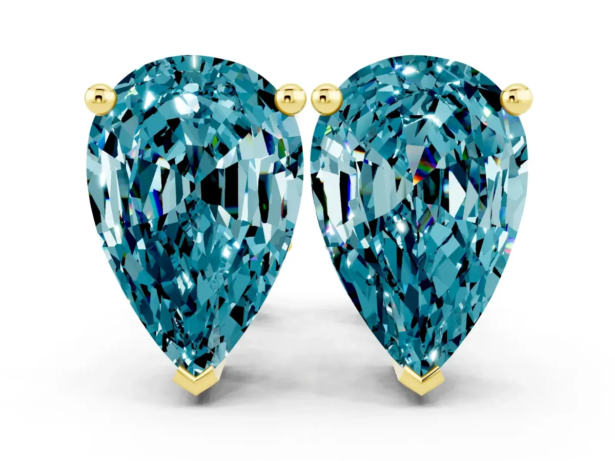 Pear Cut Blue Topaz Stud Earrings Yellow gold