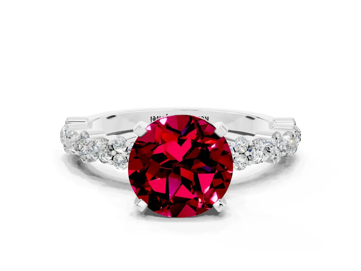 Round Cut Garnet Side Stone Solitaire Ring with Round and Four-Prong Setting Platinum