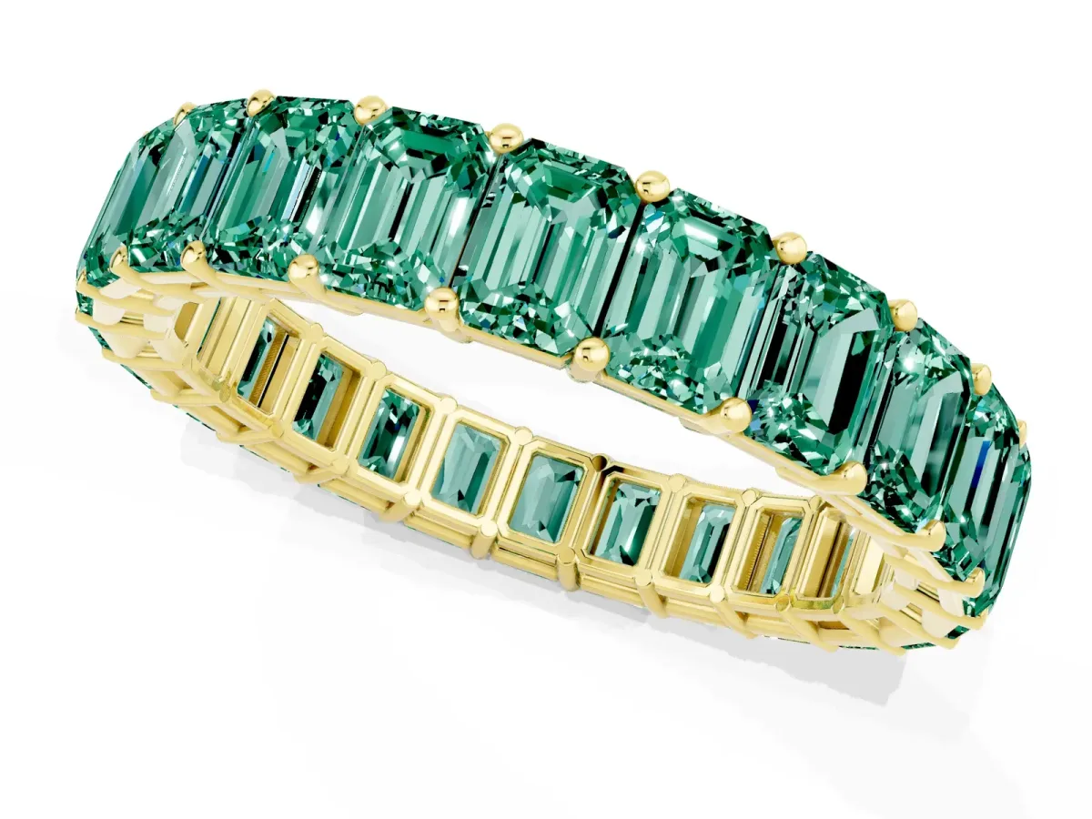 Emerald Cut Green Sapphire Eternity Band with Shared Prong Setting Yellow gold