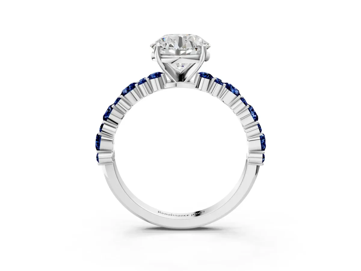 Round Cut Diamond Side Stone Solitaire Ring with Round Blue Sapphire and Four-Prong Setting Platinum