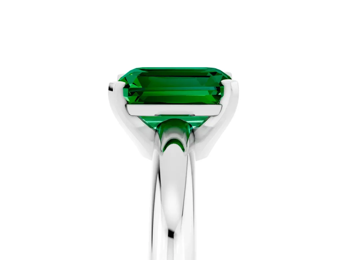 Emerald Cut Emerald Solitaire Engagement Ring with Round Band and Four-Prong Setting Silver