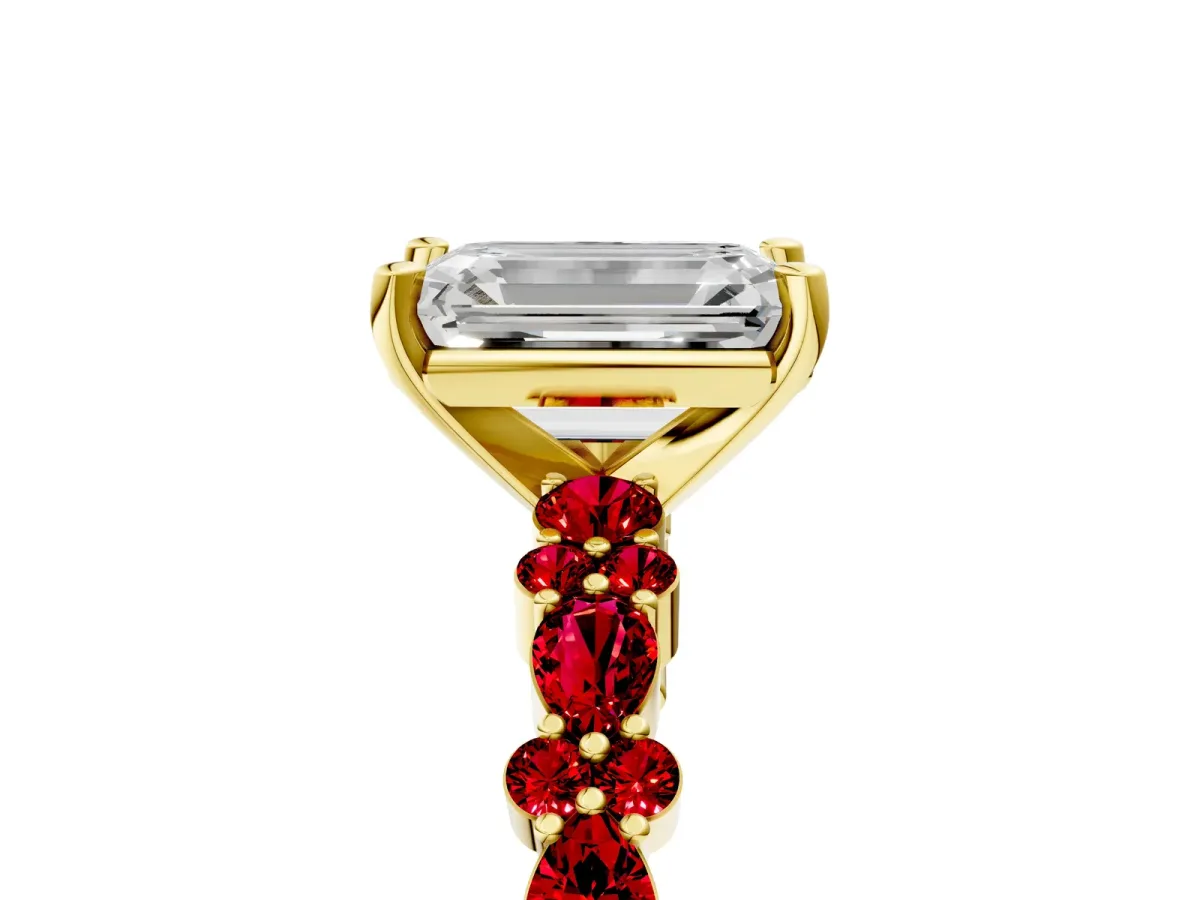 Emerald Cut Diamond Side Stone Solitaire Ring with Round Ruby and Four-Prong Setting Yellow gold