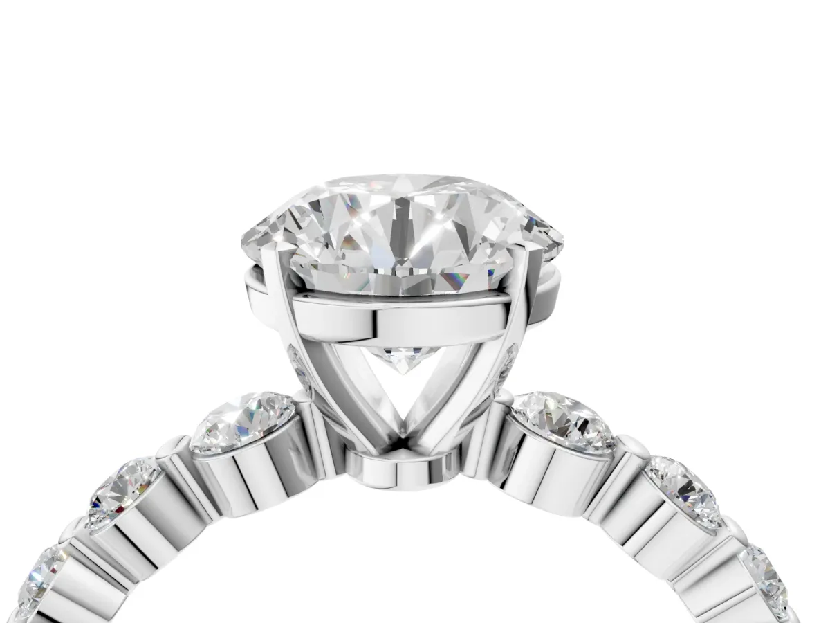 Round Cut Solitaire Diamond Ring with Pave Band and Four-Prong Setting Silver