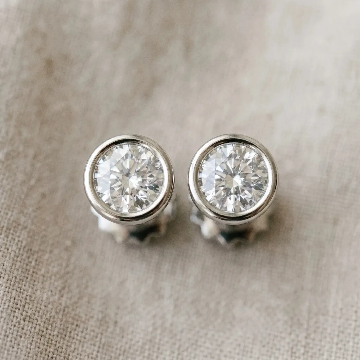 Bezel Set Round Diamond Stud Earrings with Push Back White gold