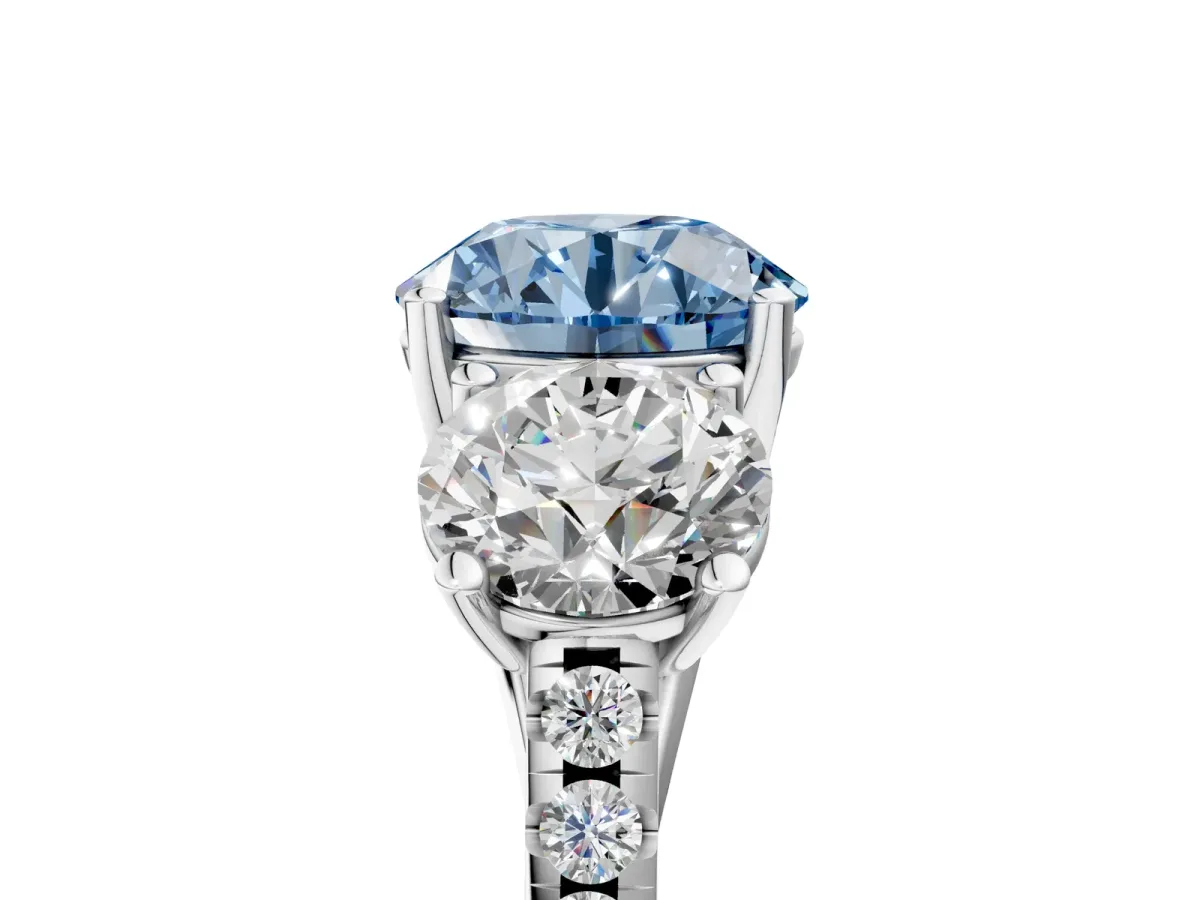 Fancy Blue Three-Stone Round Cut Diamond Ring with Round Pavé Band and Prong Setting Platinum