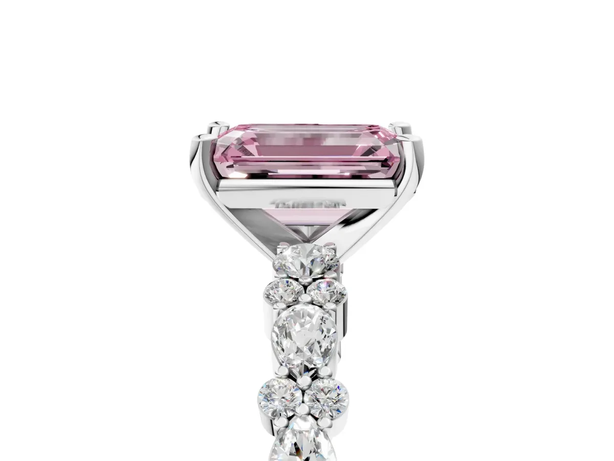 Fancy Pink Emerald Cut Diamond Side Stone Solitaire Ring with Round and Four-Prong Setting Platinum