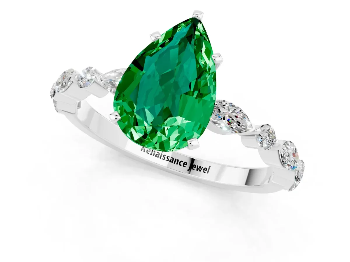 Pear Cut Emerald Ring with Marquise and Round Side Stones and Four-Prong Setting Silver