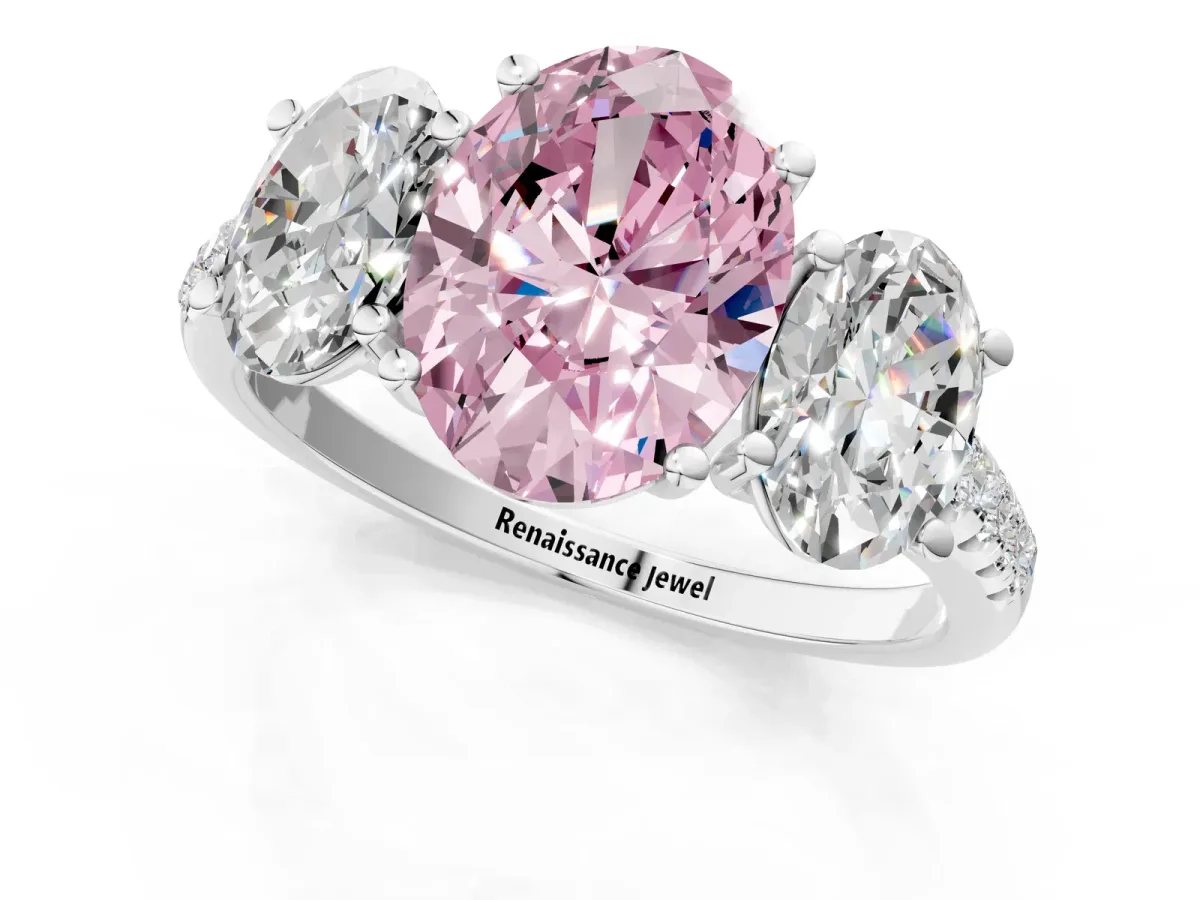Fancy Pink Three-Stone Oval Cut Diamond Ring with Round Pavé Band and Prong Setting Silver