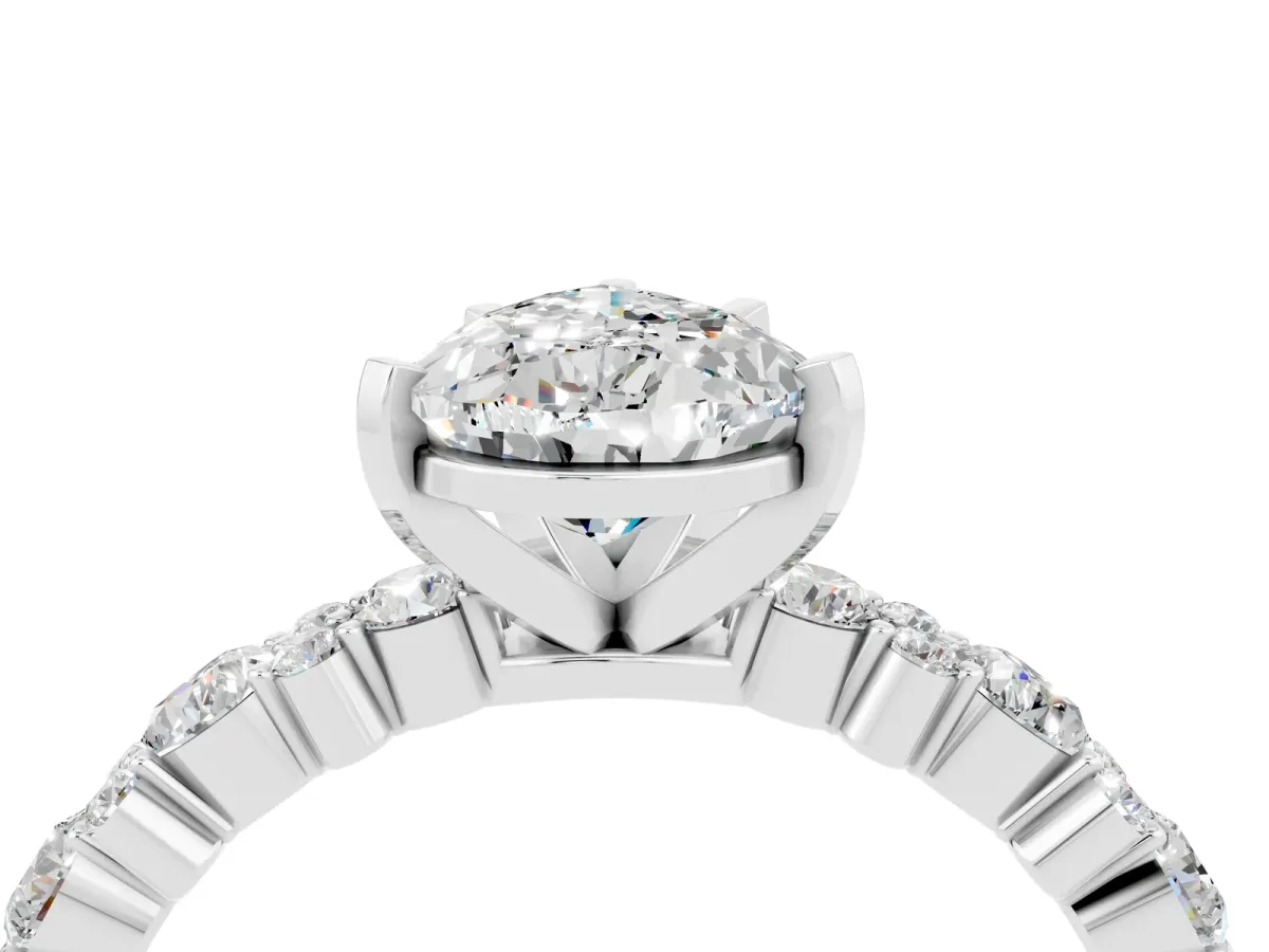 Pear Cut Moissanite Side Stone Solitaire Ring with Round and Four-Prong Setting White gold