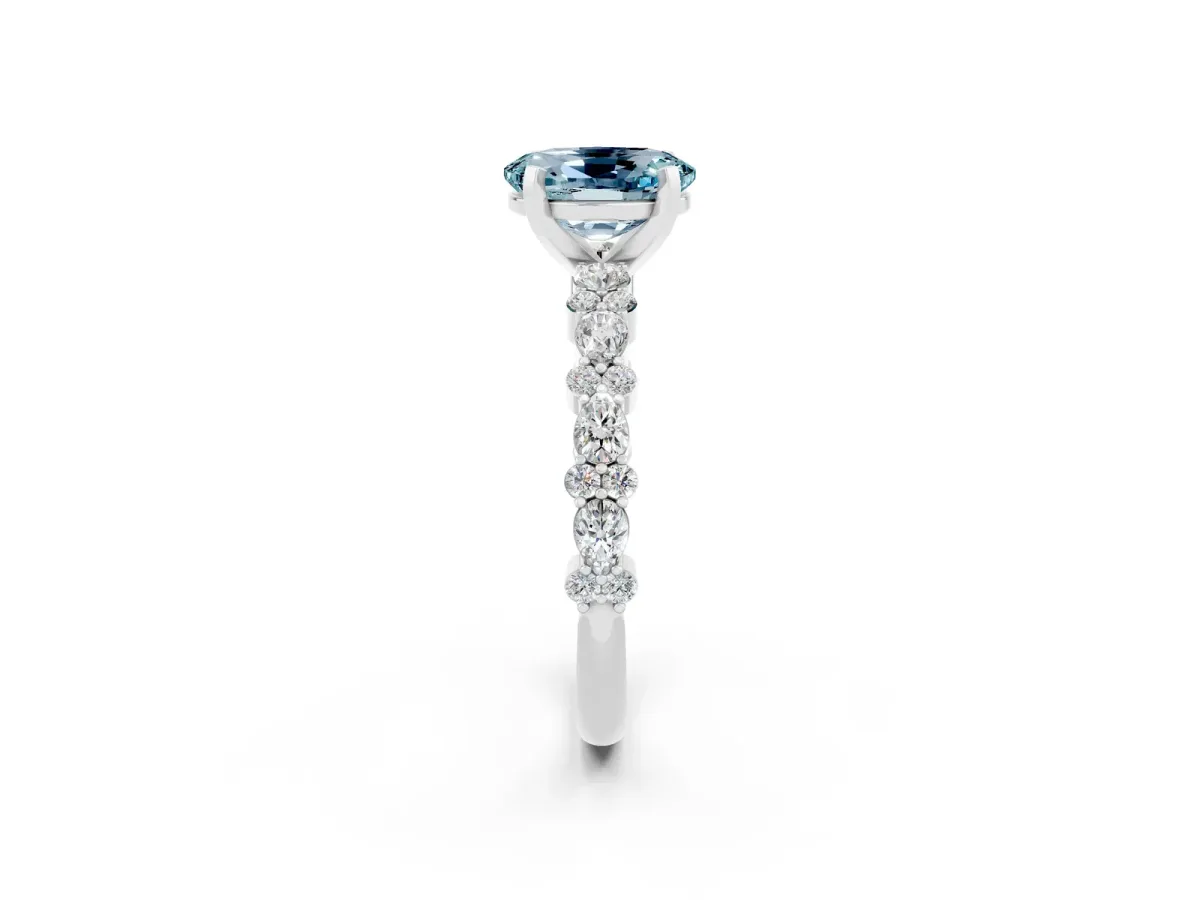 Oval Cut Aquamarine Side Stone Solitaire Ring with Round and Four-Prong Setting Platinum