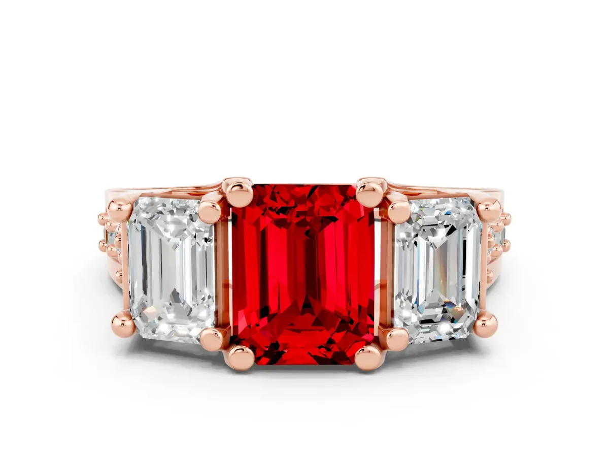 Emerald Cut Ruby Three-Stone Ring with Channel Set Band and Four-Prong Setting Rose gold