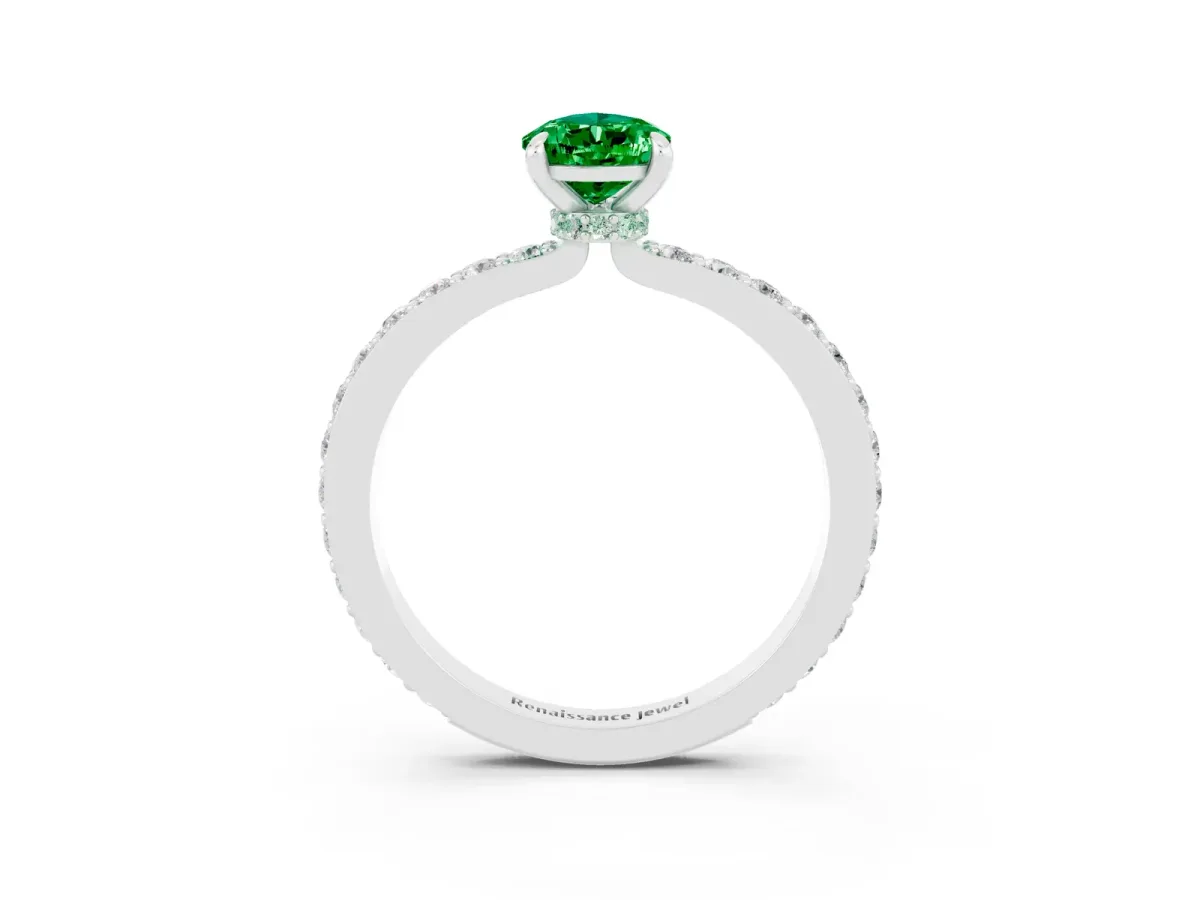 Pear Cut Emerald Solitaire Engagement Ring with Pavé Band and Four-Prong Setting Silver