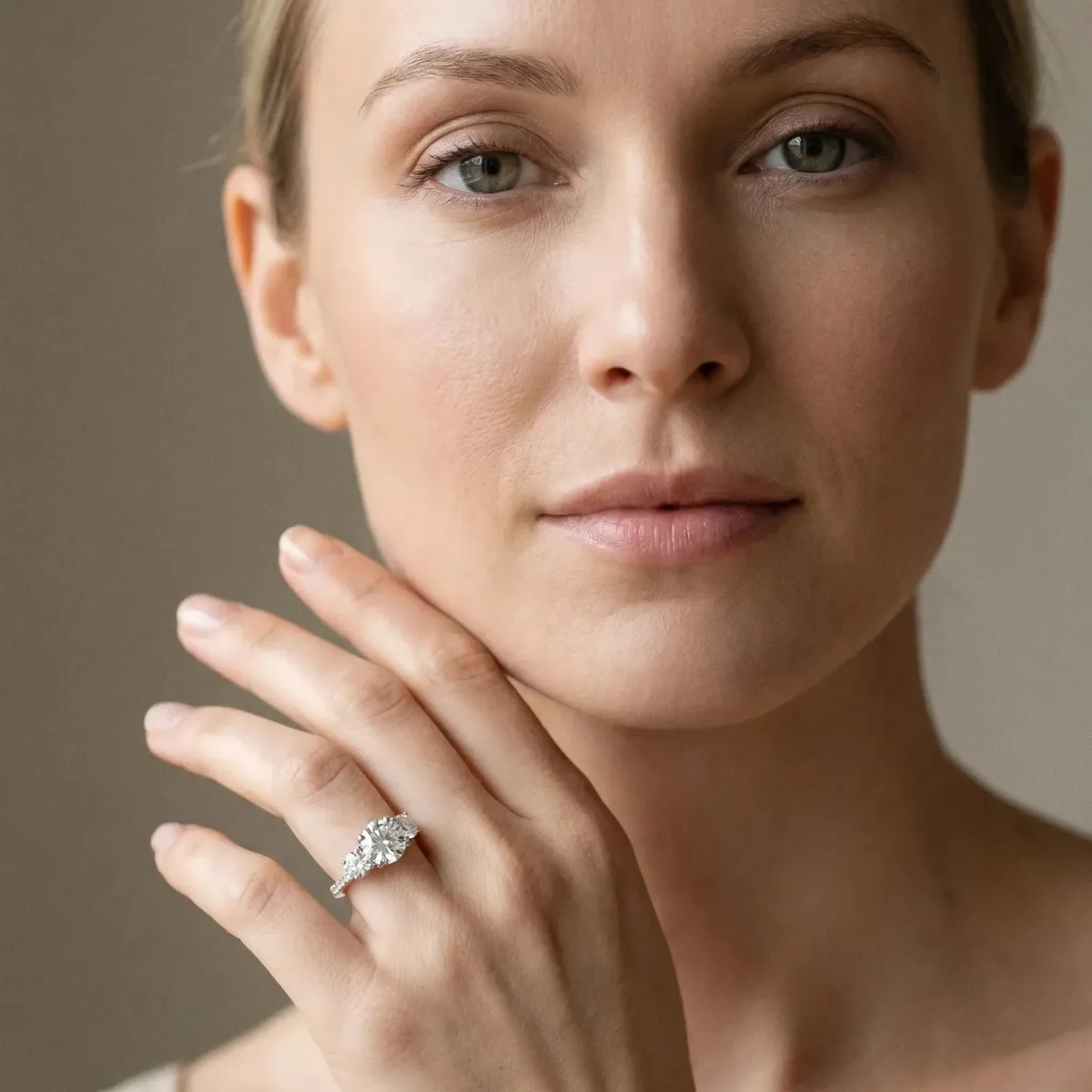 Round Cut Diamond Three-Stone Ring with Prong Setting and Pavé Band Platinum