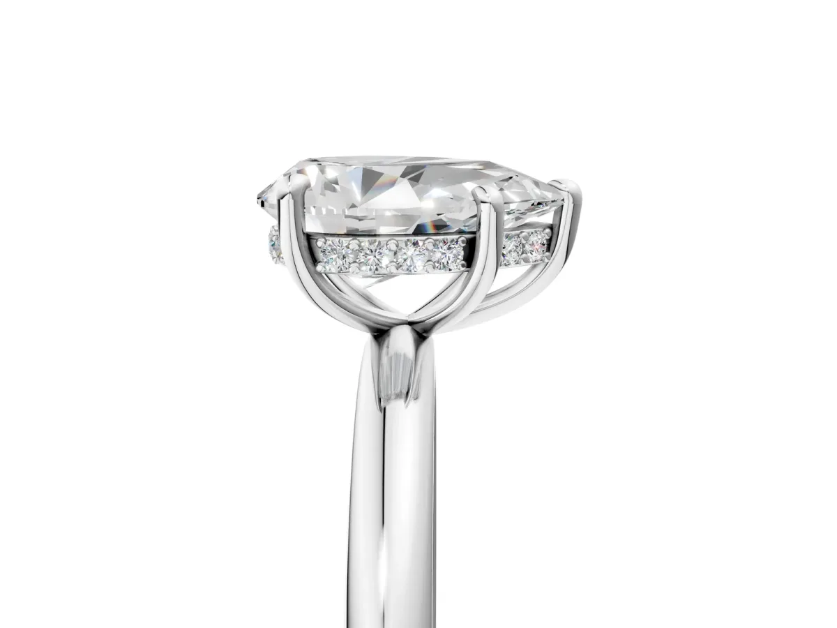 Pear Cut Diamond Solitaire Ring with Thin Band and Four-Prong Setting Silver