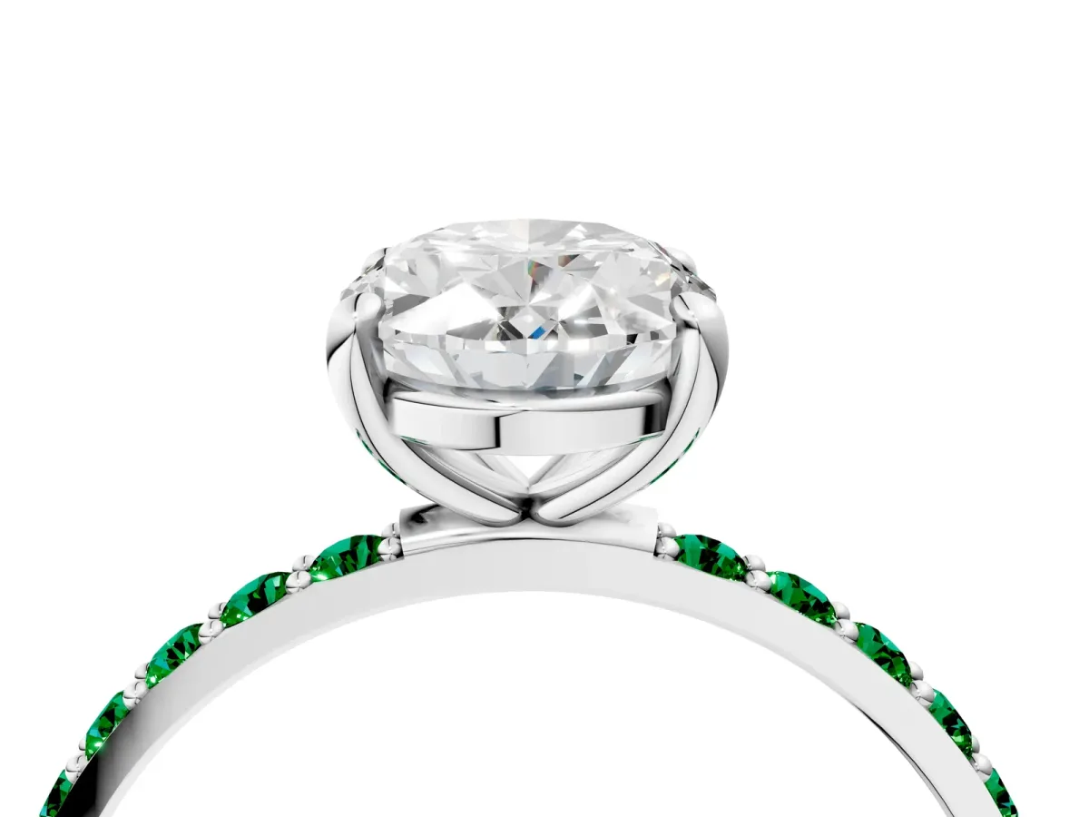 Oval Cut Diamond Solitaire Ring with Round Emerald Pavé Band and Prong Setting Platinum