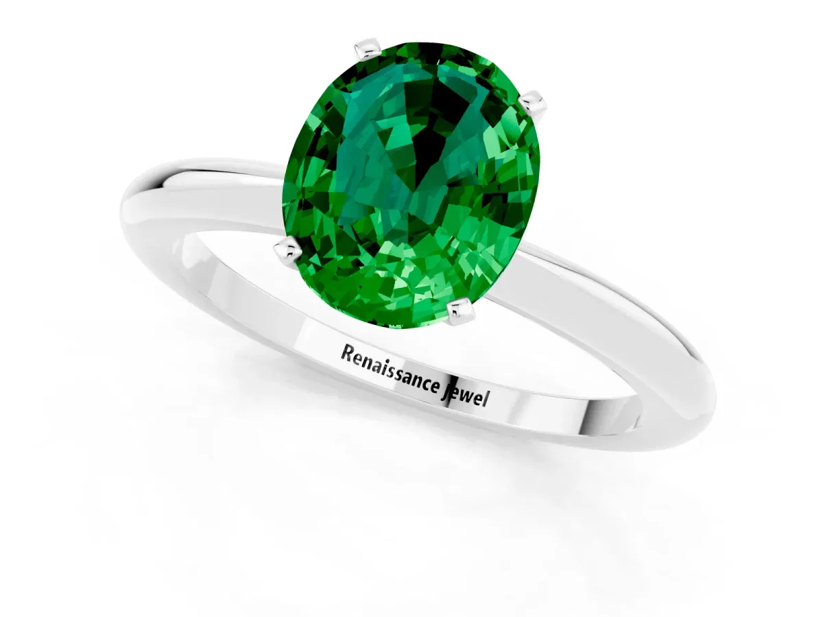 Oval Cut Emerald Solitaire Ring with Six-Prong Setting and Classic Band Silver