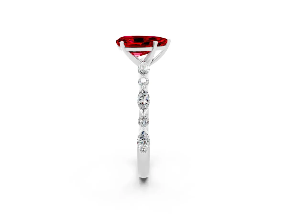Pear Cut Ruby Ring with Marquise and Round Side Stones and Four-Prong Setting Silver