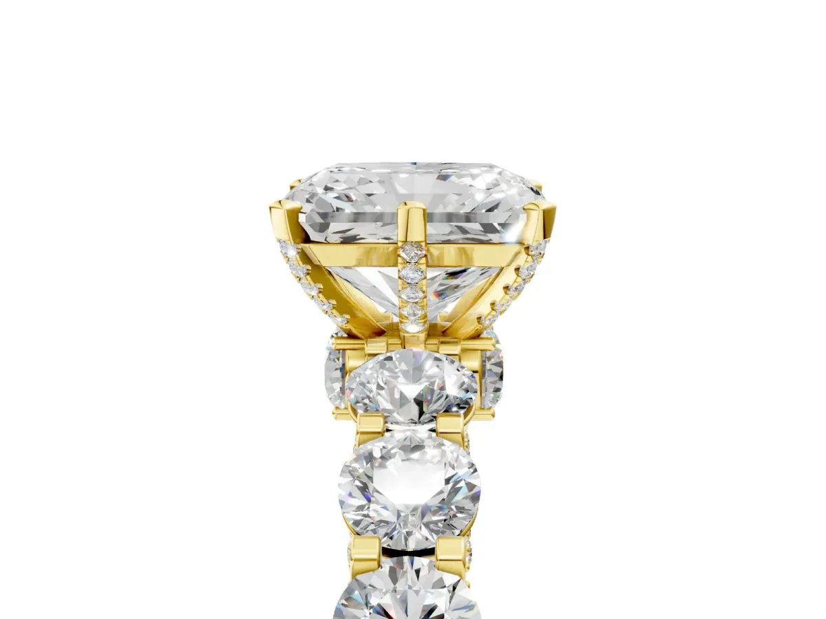 Radiant Cut Diamond Side Stone Engagement Ring with Four-Prong Setting Yellow gold