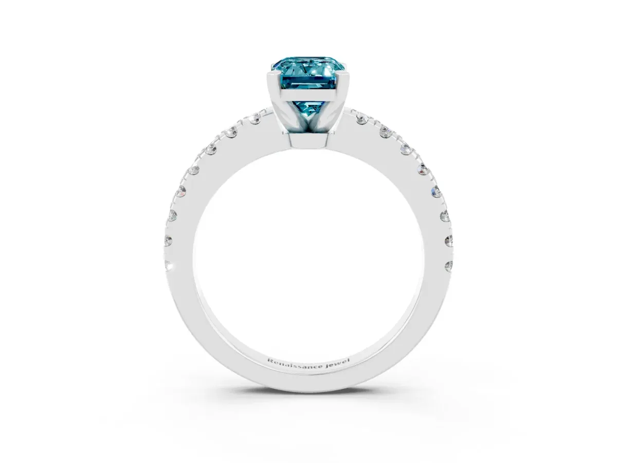 Emerald Cut Solitaire Blue Topaz with Pavé Band and Four-Prong Setting Silver