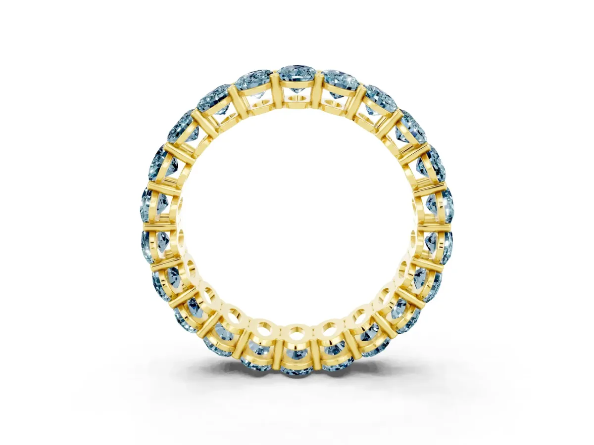 Oval Cut Aquamarine Eternity Band with Shared Prong Setting Yellow gold