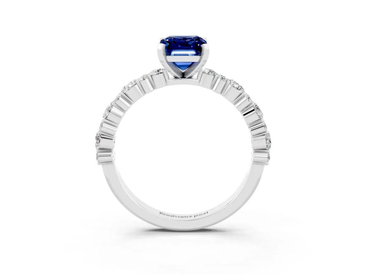 Emerald Cut Blue Sapphire Side Stone Solitaire Ring with Round and Four-Prong Setting Silver