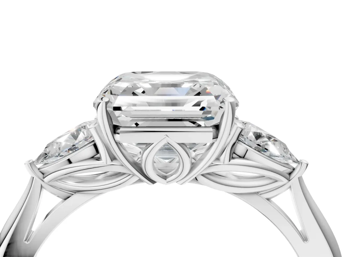 Three-Stone Asscher Cut Diamond Ring with Pear Side Stones in Four-Prong Setting Platinum