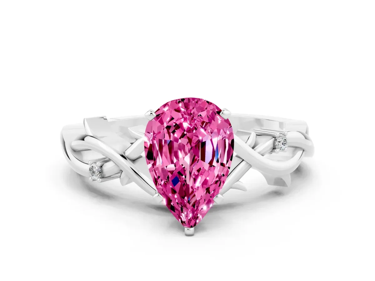 Pear Cut Pink Sapphire Solitaire Ring with Twisted Band and Prong Setting Platinum
