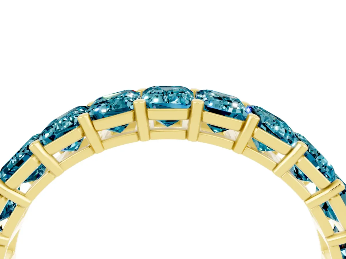 Emerald Cut Blue Topaz Eternity Band with Shared Prong Setting Yellow gold
