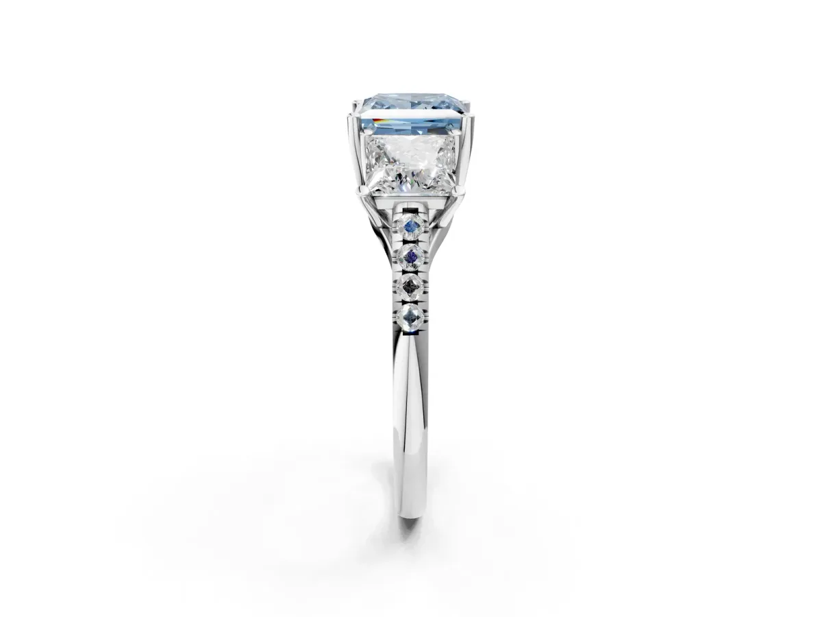 Fancy Blue Three-Stone Princess Cut Diamond Ring with Round Pavé Band and Prong Setting Silver