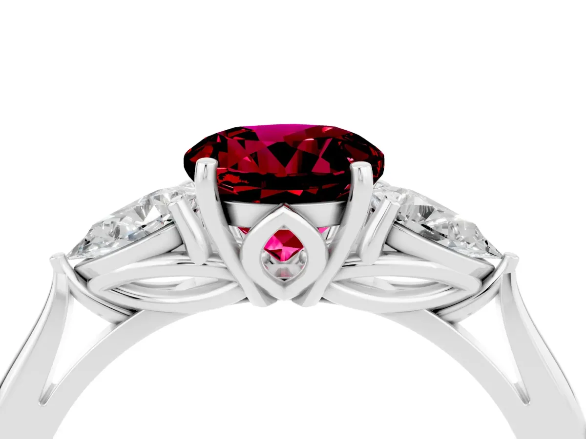 Three-Stone Round Cut Garnet Ring with Pear Side Stones in Four-Prong Setting Platinum