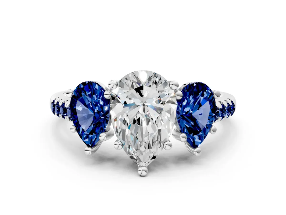 Three-Stone Pear Cut Diamond Ring with Round Blue Sapphire Pavé Band and Prong Setting Silver