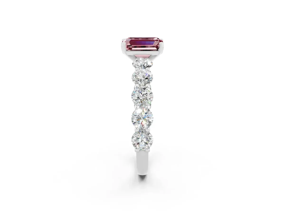 Emerald Cut Morganite Prong Setting with Side Stones on a Pave Band Platinum