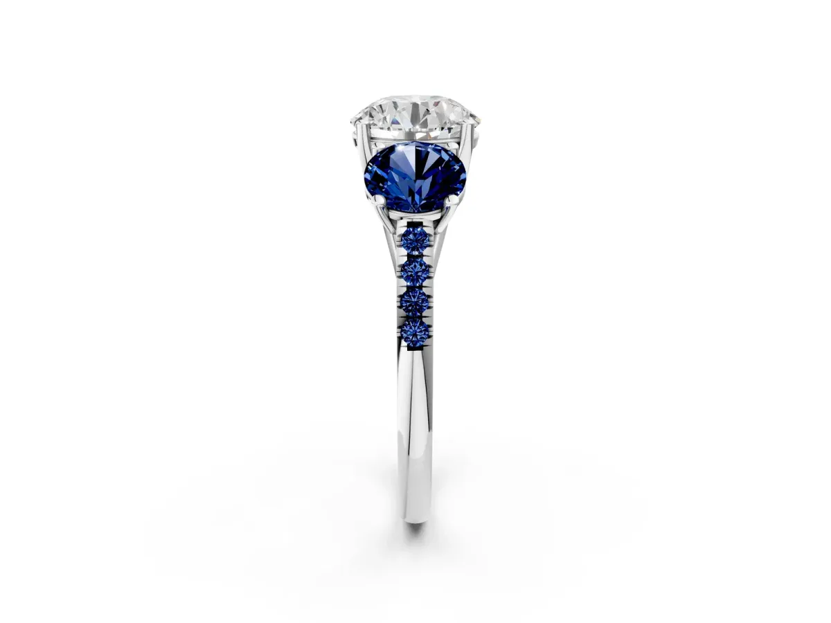 Three-Stone Round Cut Diamond Ring with Round Blue Sapphire Pavé Band and Prong Setting Silver