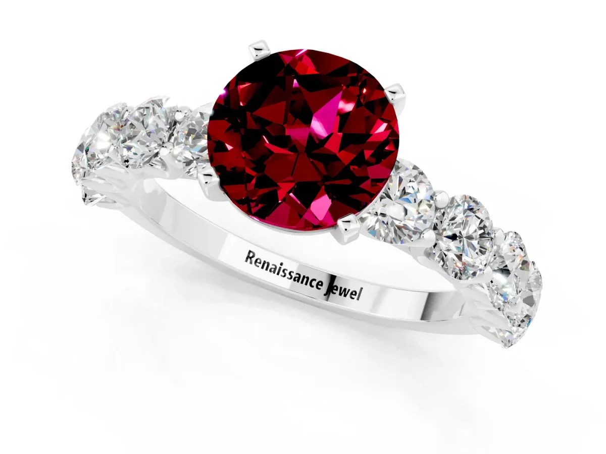 Round Cut Garnet Prong Setting with Side Stones on a Pave Band Platinum
