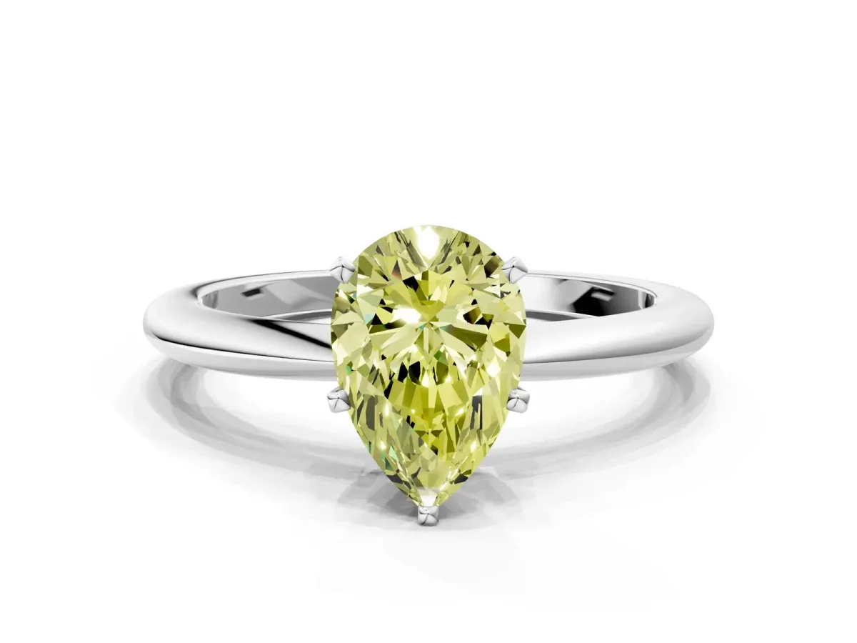 Fancy Yellow Pear Cut Diamond Solitaire Ring with Six-Prong Setting and Classic Band Silver