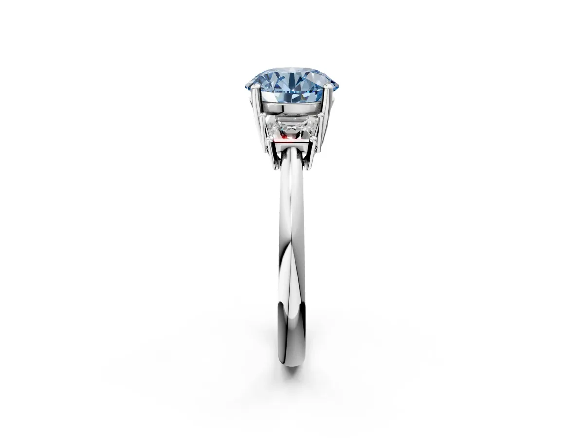 Fancy Blue Round Cut Diamond Three-Stone Ring with Trapezoid Side Stones and Prong Setting White gold