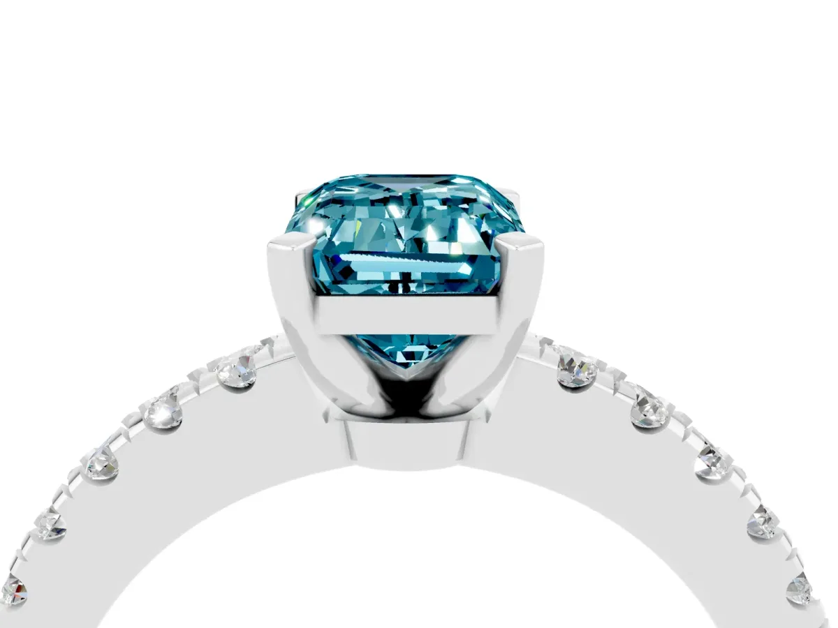Emerald Cut Solitaire Blue Topaz with Pavé Band and Four-Prong Setting Silver