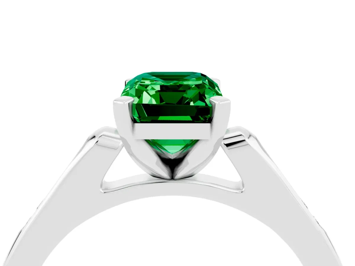 Emerald Cut Emerald Solitaire Ring with Channel Set Round Band and Prong Setting White gold
