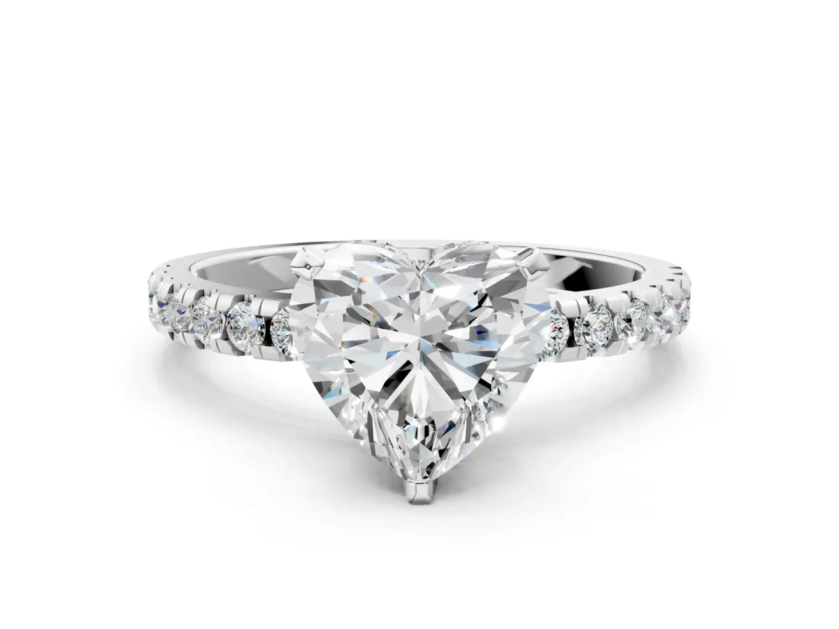 Heart Cut Diamond Solitaire Ring with Round Pavé Band and Four-Prong Setting Silver
