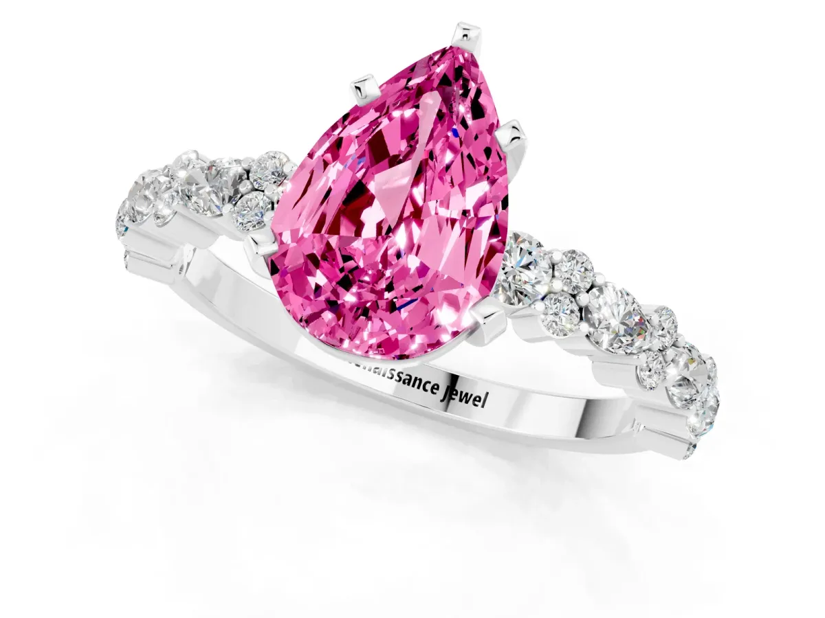 Pear Cut Pink Sapphire Side Stone Solitaire Ring with Round and Four-Prong Setting Silver