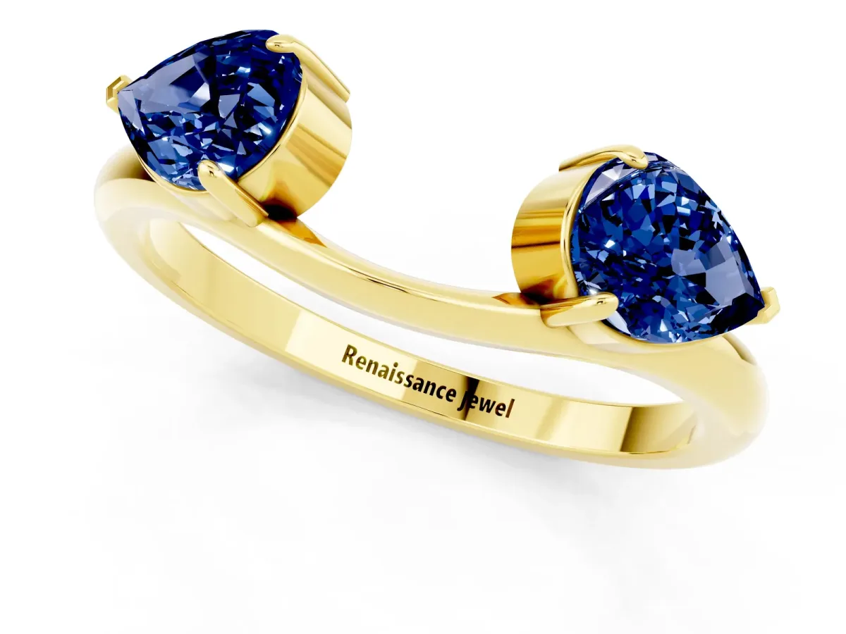 Two-Stone Pear Blue Sapphire Bypass Ring with Prong Setting Yellow gold