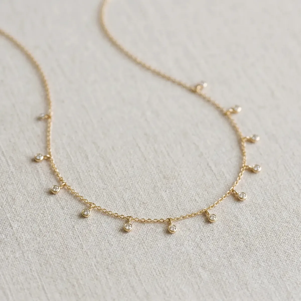 Round Bezel Set Diamond Station Necklace with Cable Chain Yellow gold
