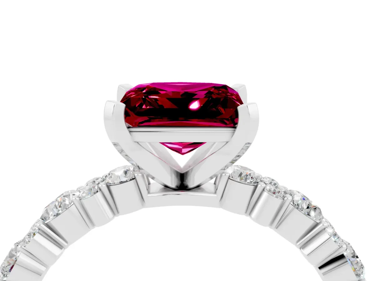 Princess Cut Garnet Side Stone Solitaire Ring with Round and Four-Prong Setting Silver