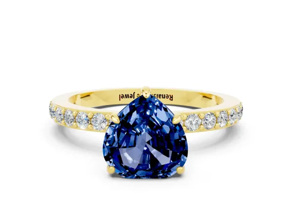 Heart Cut Blue Sapphire Solitaire Engagement Ring with Pavé Band and Four-Prong Setting Yellow gold