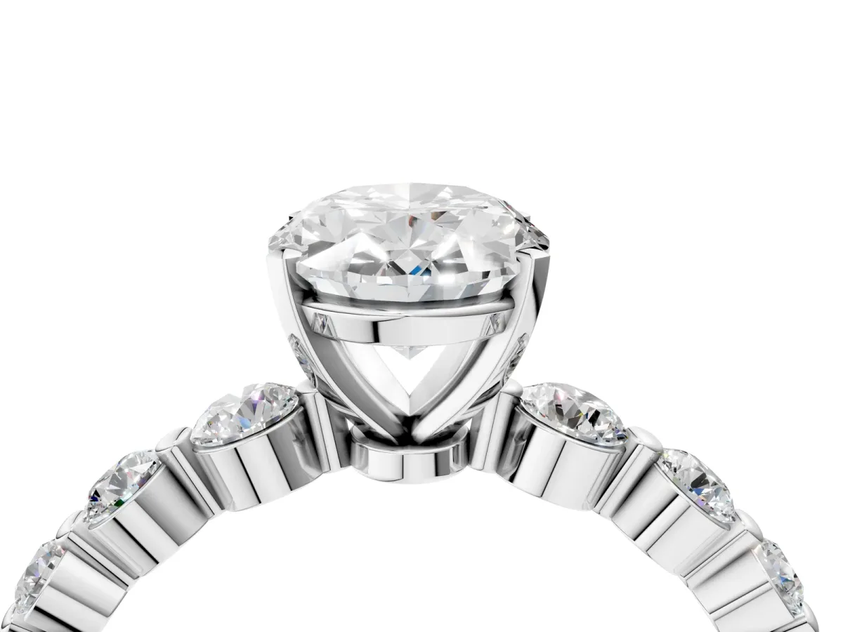 Oval Cut Solitaire Diamond Ring with Pave Band and Four-Prong Setting Silver