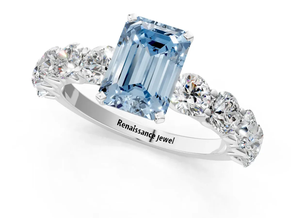 Fancy Blue Emerald Cut Diamond Prong Setting with Side Stones on a Pave Band Silver