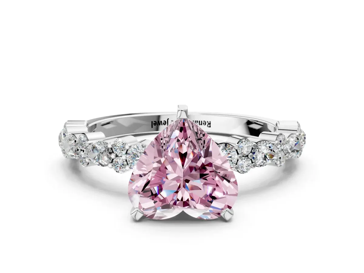 Fancy Pink Heart Cut Diamond Side Stone Solitaire Ring with Round and Four-Prong Setting Platinum