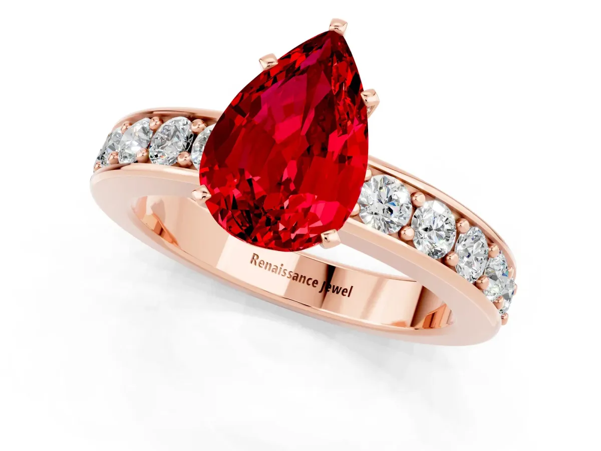 Pear Cut Ruby Engagement Ring with Channel Set Round Band and Prong Setting Rose gold
